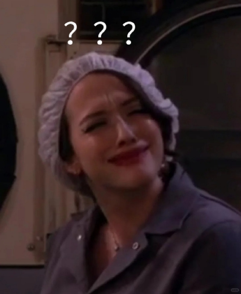 Cô gái đang cúi đầu đặt tay lên cằm với dấu hỏi quanh đầu.