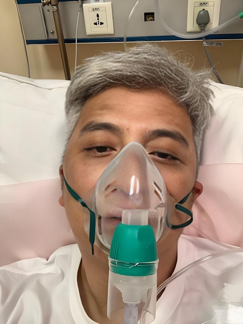 Người đàn ông đeo oxy, vibe “xỉu ngang vì cú twist bất ngờ”.